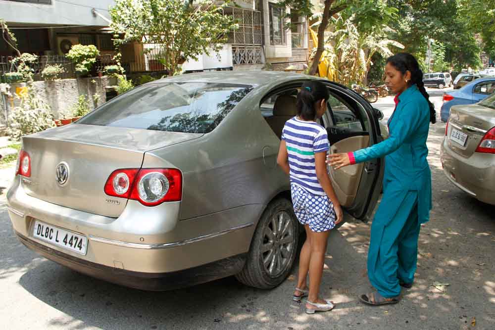 Azad Foundation India women driver escorting passengers