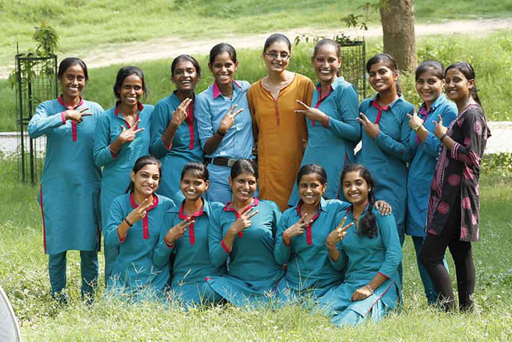 Azad Foundation India independent women drivers posing happily